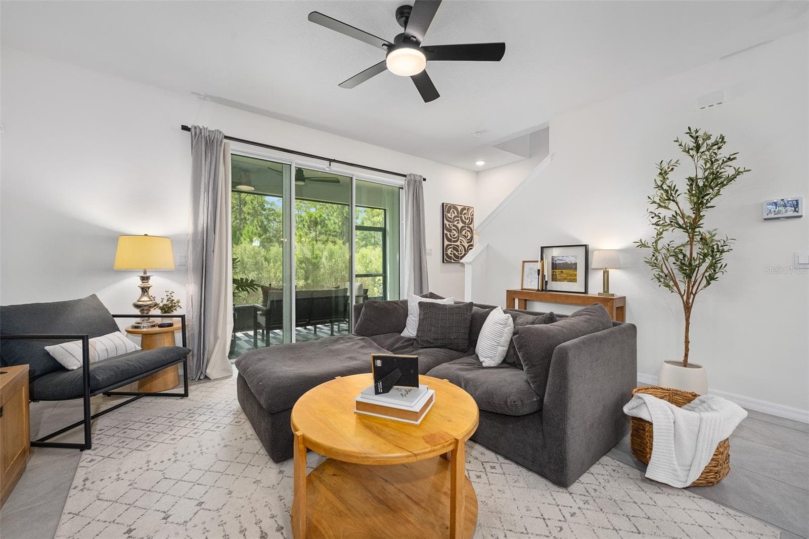 Living room, ceiling fan added - 166 REENA DR, DAYTONA BEACH