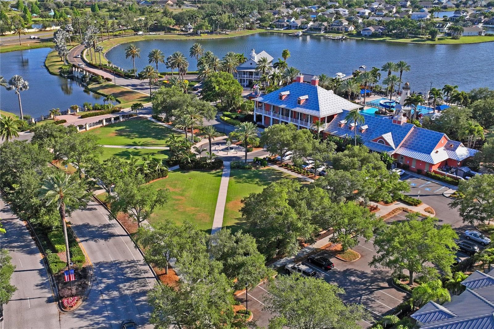 Aerial Clubhouse overlooking lagoon - 5714 SEA TROUT PL, APOLLO BEACH