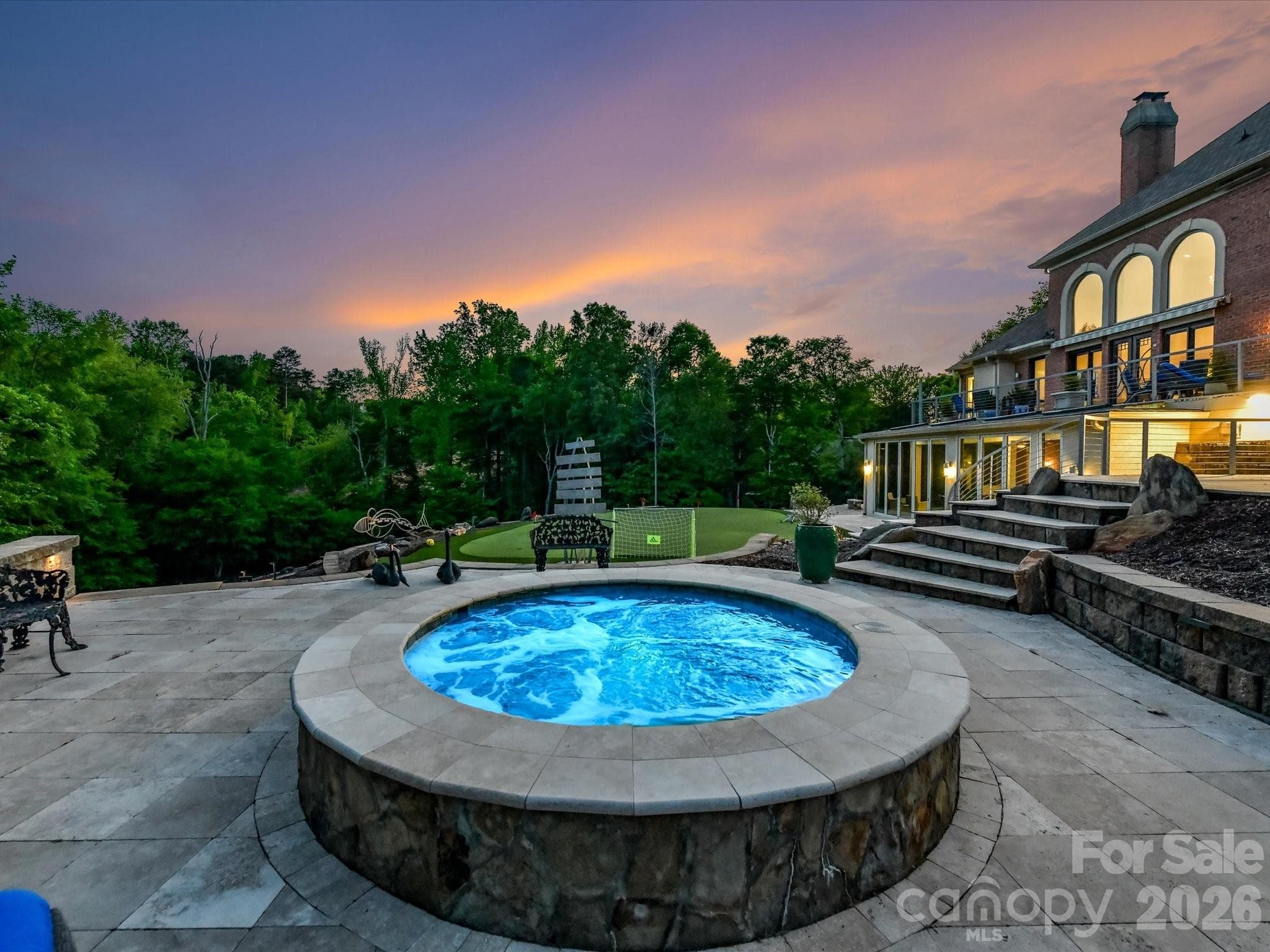 Twilight view from the oversized spa. - 2723 Providence Pine Lane, Charlotte
