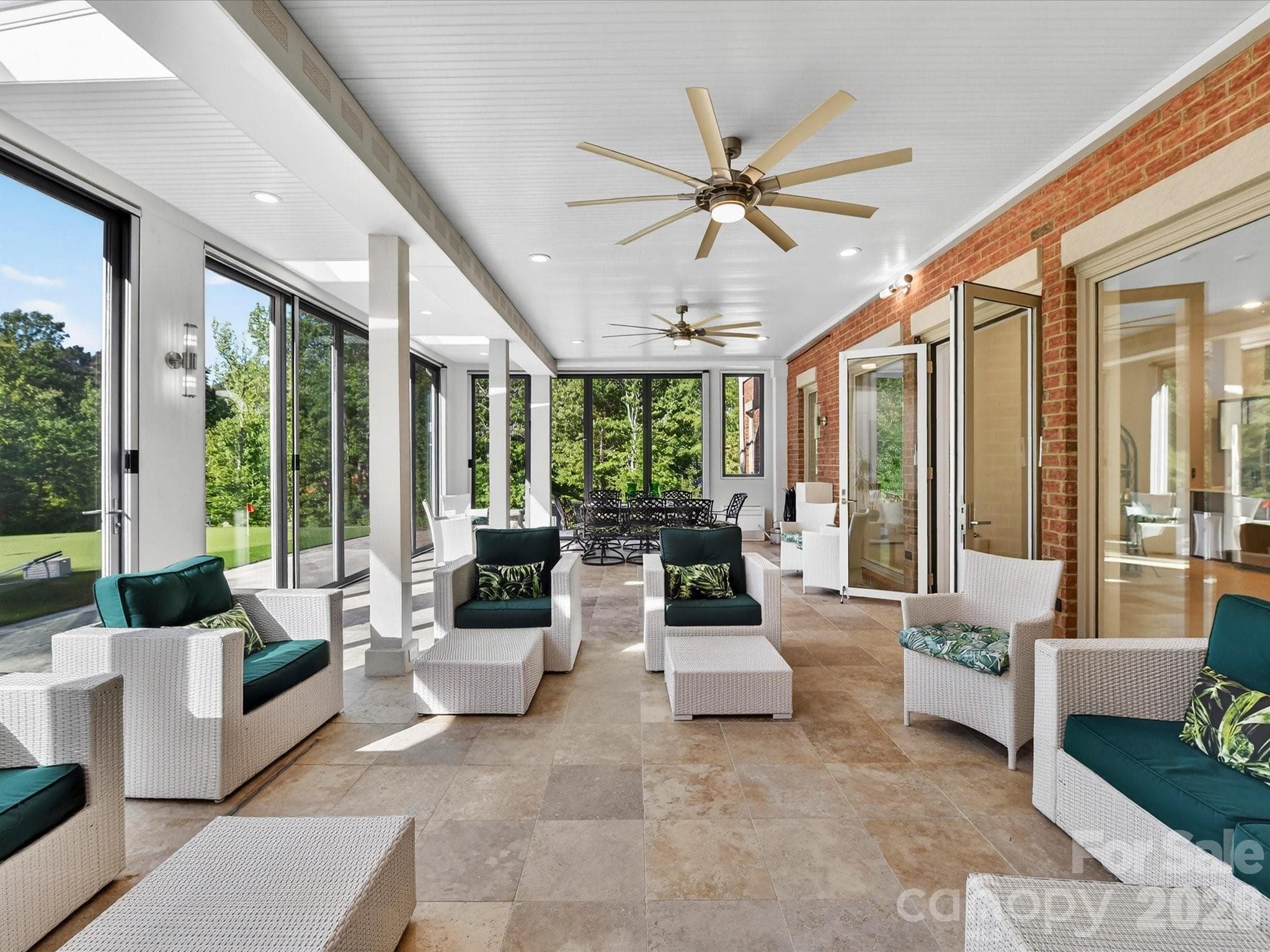 Stunning family room can be closed, screened or opened completely! - 2723 Providence Pine Lane, Charlotte