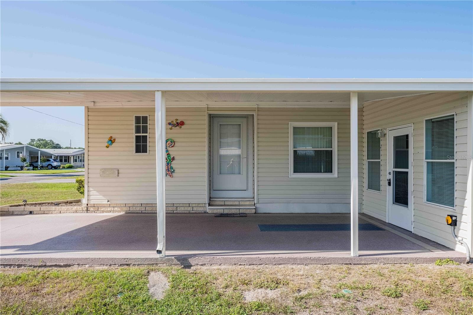 Manufactured Home at 5335 POWHATTAN ST, ZEPHYRHILLS, photo 3 of 51