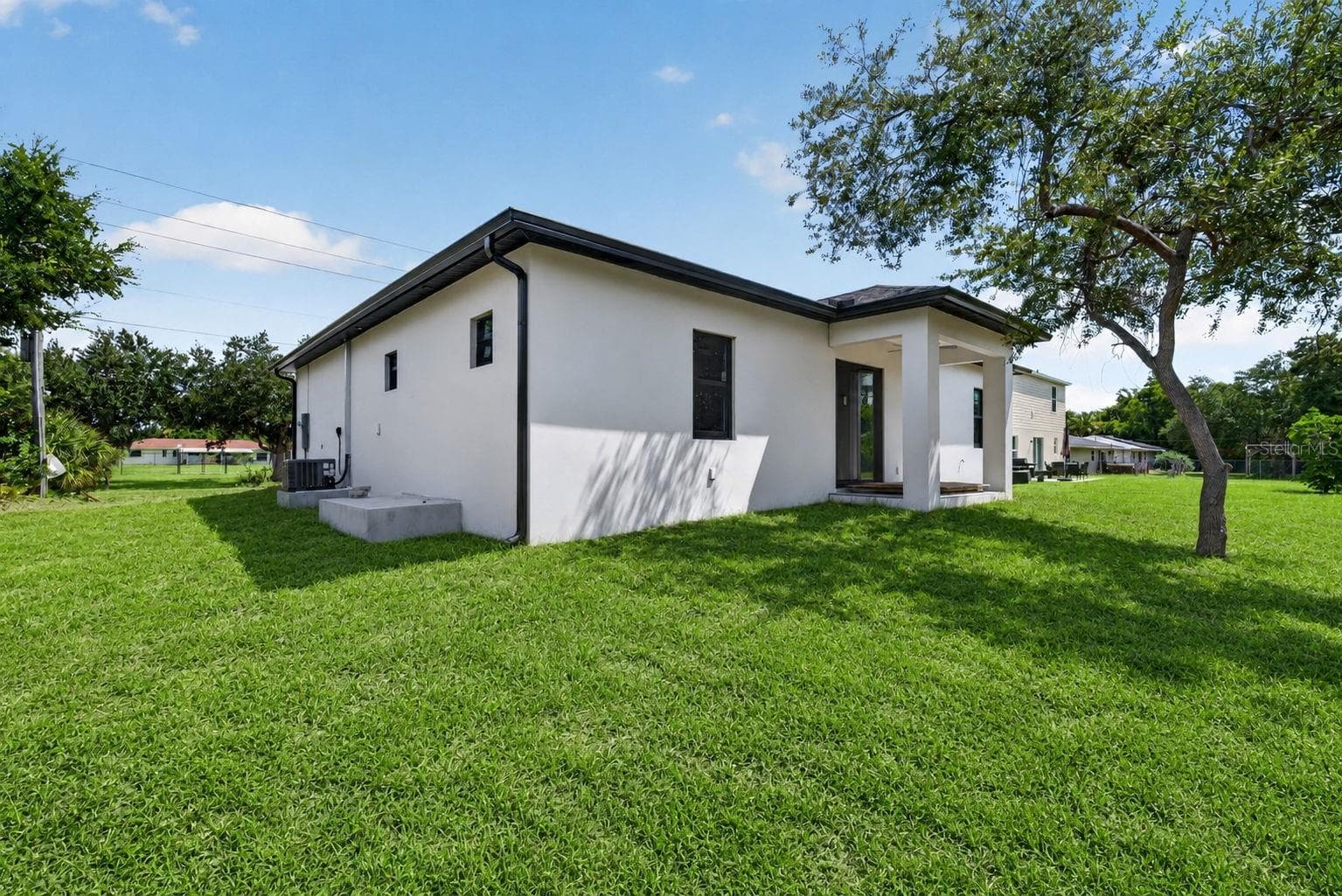 Back Exterior - 22333 ELMIRA BLVD, PORT CHARLOTTE