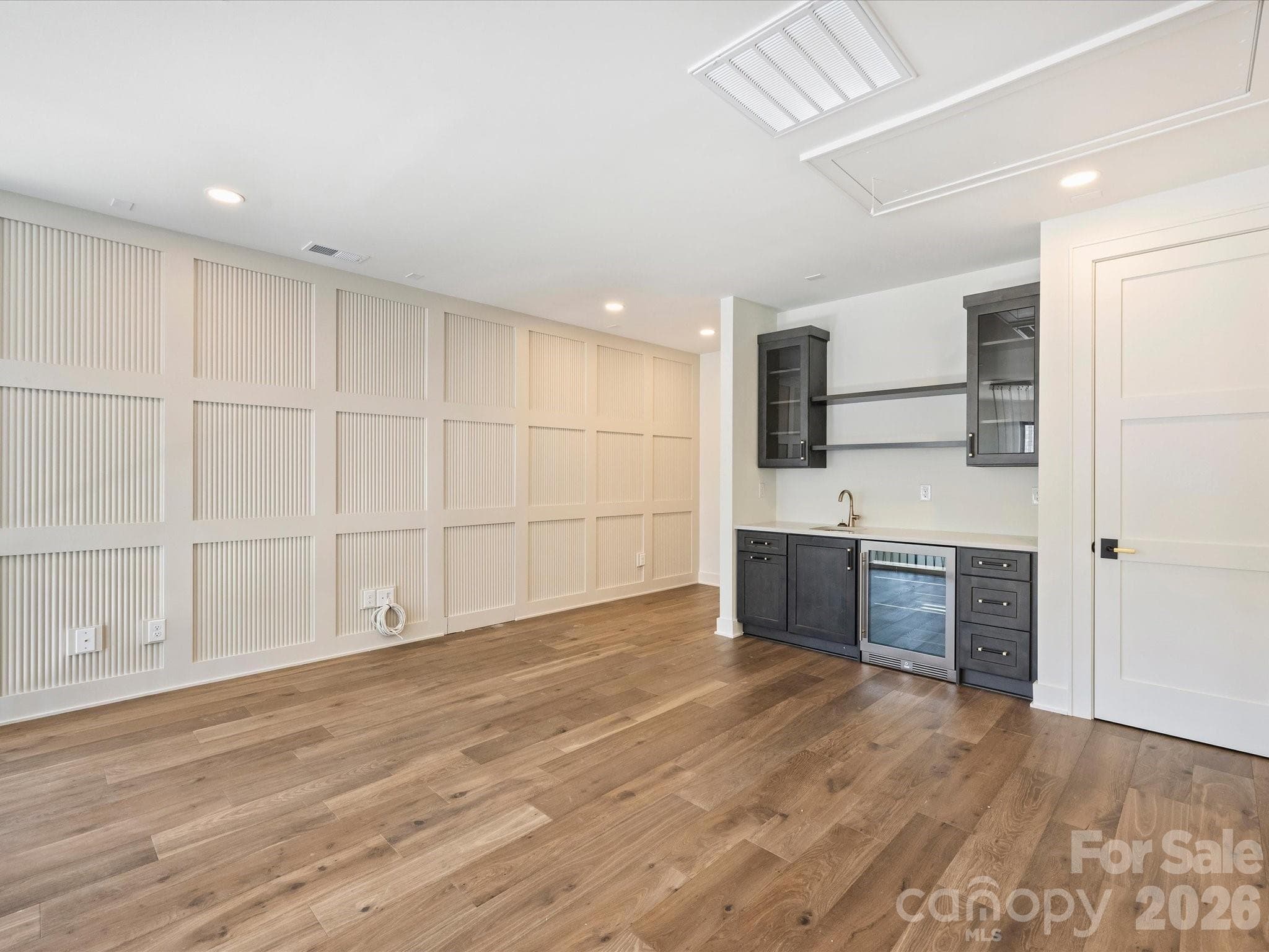 Entertainment space with wet bar on the 3rd floor - Charlotte