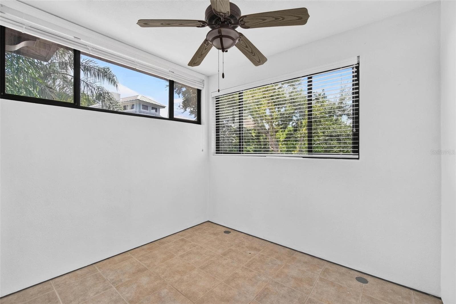 2nd Floor Primary Suite Enclosed Balcony - 1100 TORTUGA CIR NE, ST PETERSBURG