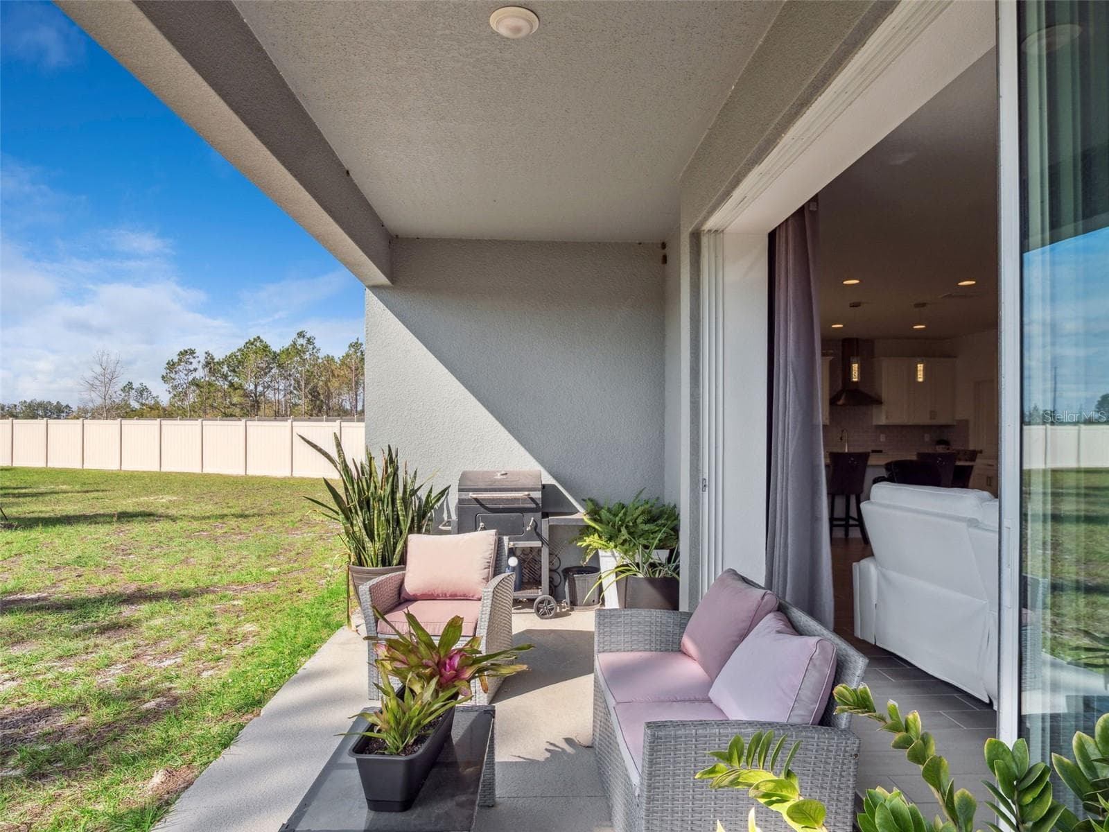 covered patio - 591 VIA BELLA CT, HOWEY IN THE HILLS