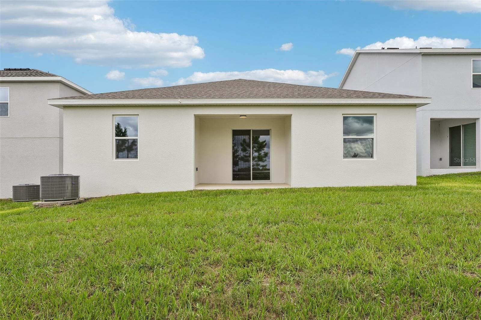 Rear Exterior - 7272 ROLLING LEAF RD, GROVELAND