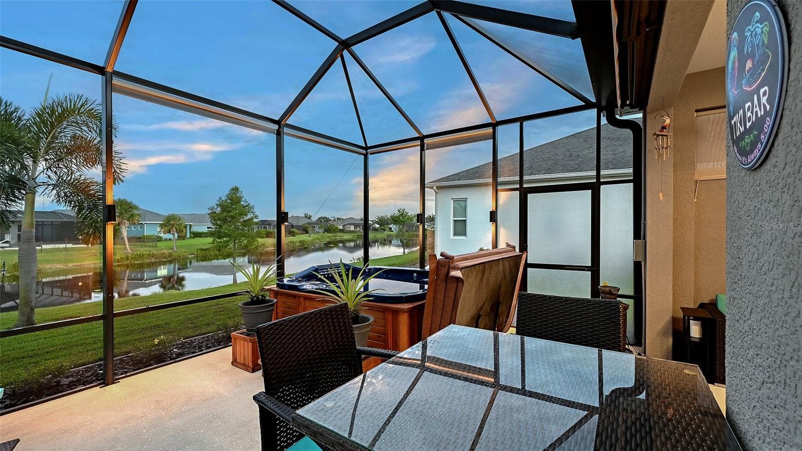 Spa with pond view - 13667 OLD CREEK CT, PARRISH