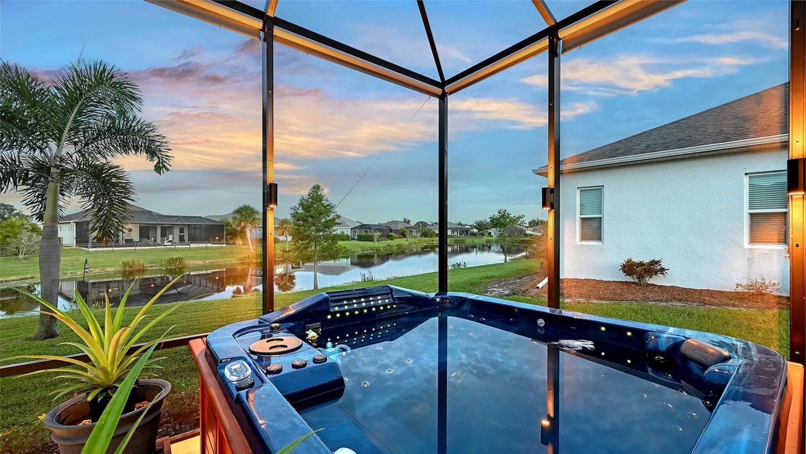 10 person spa with pond views - 13667 OLD CREEK CT, PARRISH