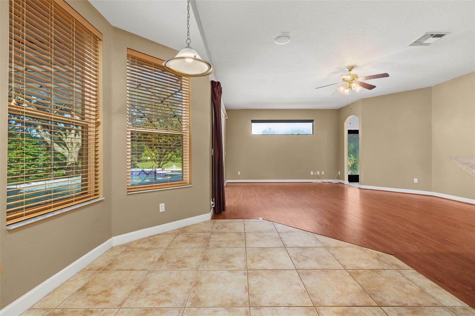 Casual dining space overlooking the pool - 2039 HARBOR COVE WAY, WINTER GARDEN