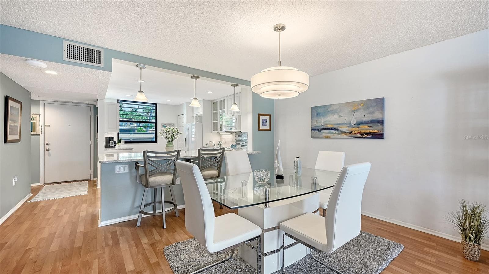 close up dining room set up- most furniture is available outside of closing - 666 WOODLAWN DR #666, BRADENTON