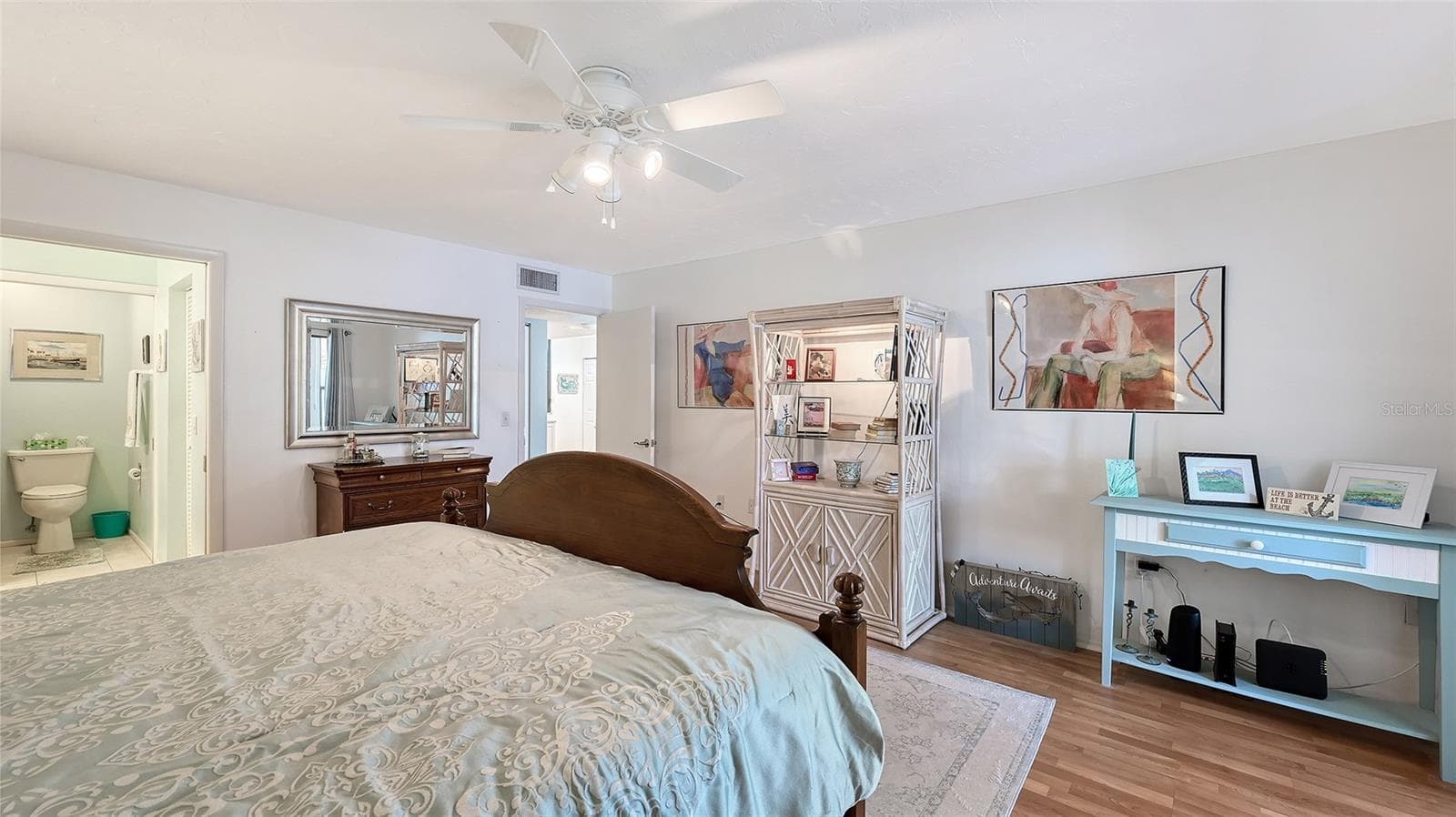 The main bathroom/walk-in closet are behind a pocket door on the left side of the photo - 666 WOODLAWN DR #666, BRADENTON