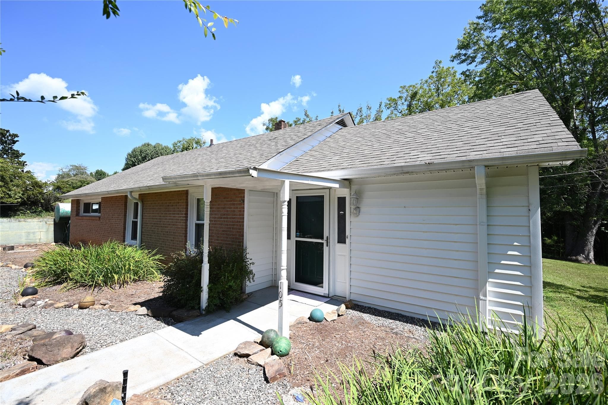 Single Family Residence at 105 Owens Avenue NE, Drexel, photo 2 of 38