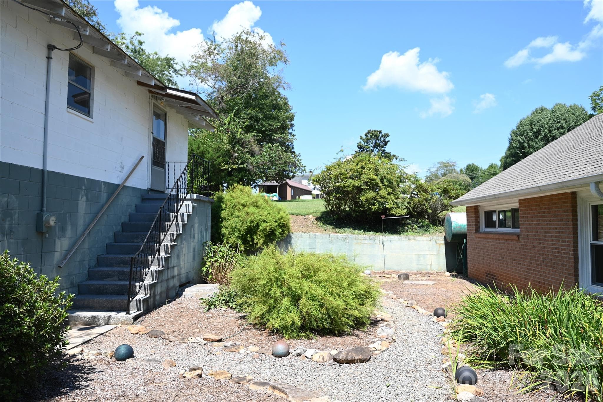 Single Family Residence at 105 Owens Avenue NE, Drexel, photo 3 of 38