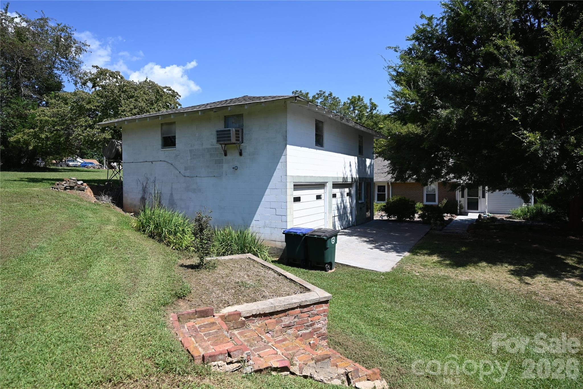 Single Family Residence at 105 Owens Avenue NE, Drexel, photo 28 of 38