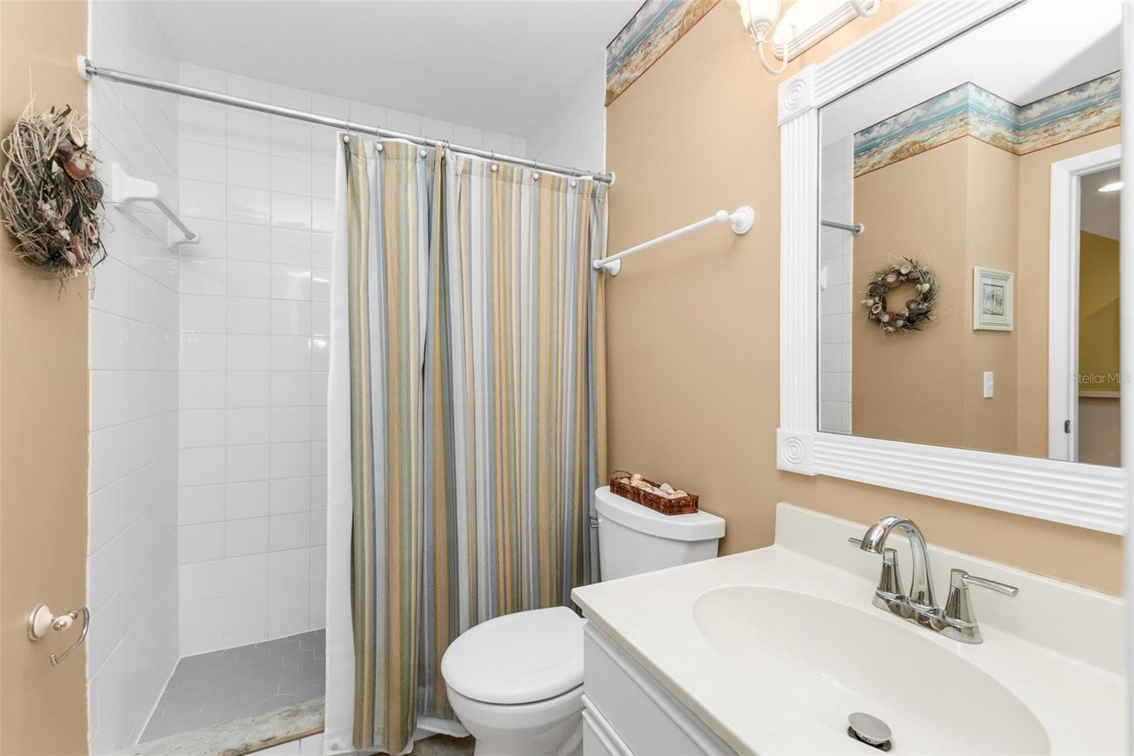 Guest bath off the hallway with walkin shower only. - 6800 PLACIDA RD #235, ENGLEWOOD
