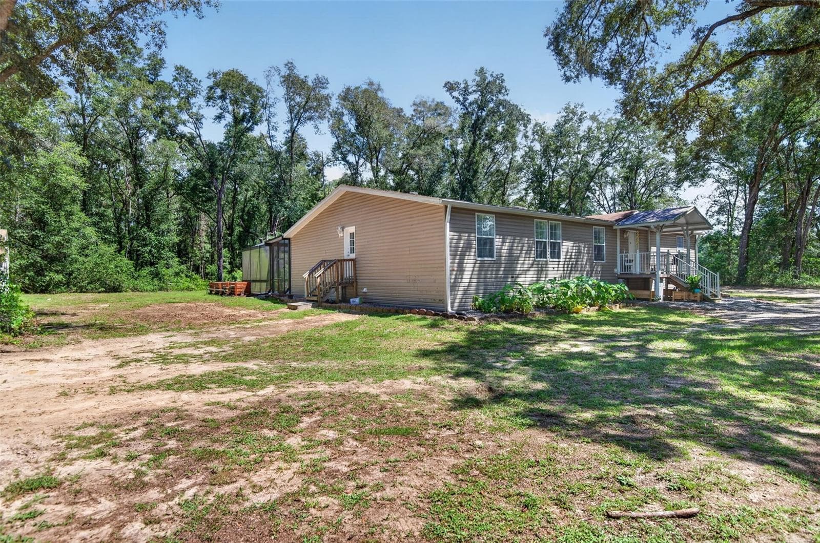 Manufactured Home at 21812 FIELD OF DREAMS LN, DADE CITY, photo 6 of 58