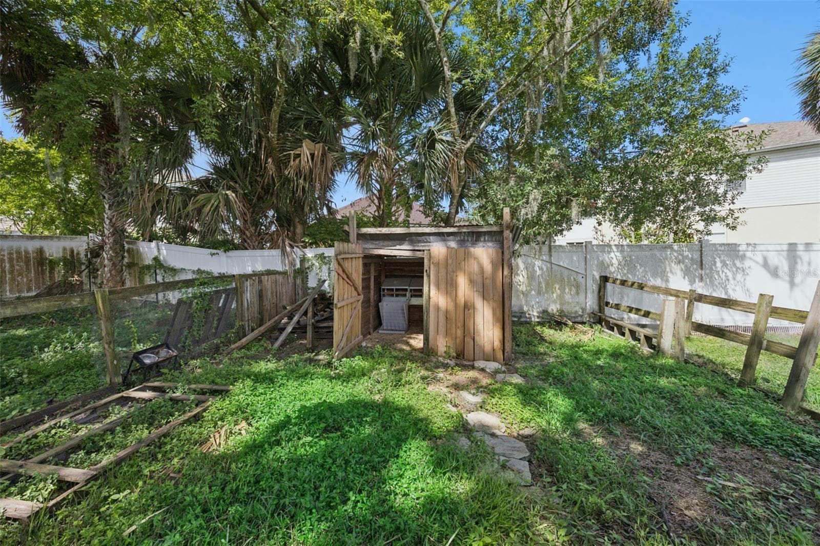 Beyond the pool, the property opens into fenced areas offering room for gardening, animals and a variety of outdoor uses. - 2201 CELERY AVE, SANFORD