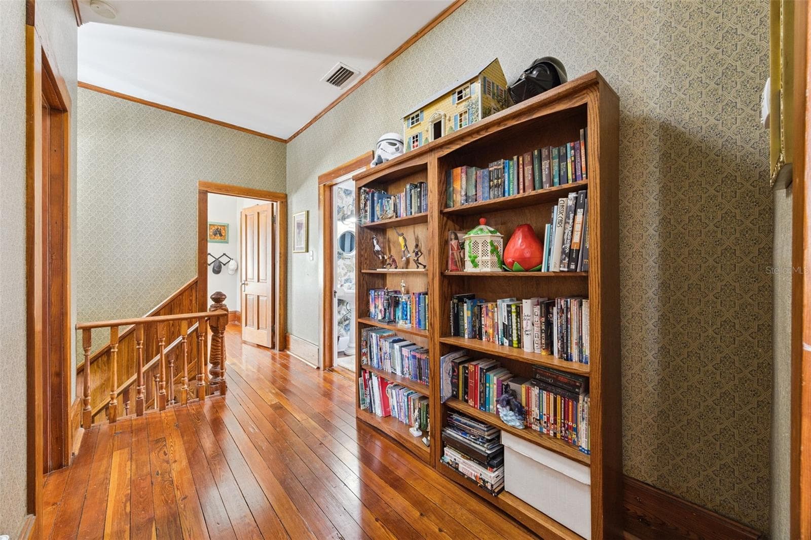 Generously proportioned bedrooms are a standout feature, with space here for multiple sleeping and sitting areas. - 2201 CELERY AVE, SANFORD