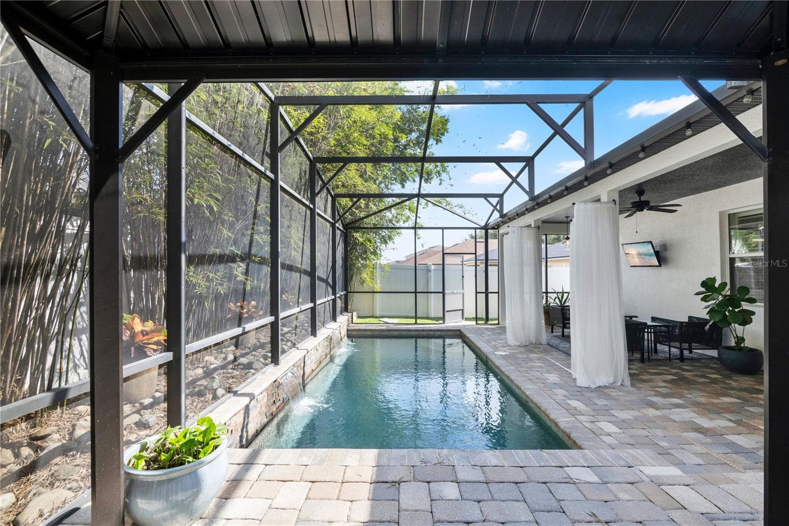 The perfect pool and seating area for relaxation. - 13547 PITANGA ST, CLERMONT