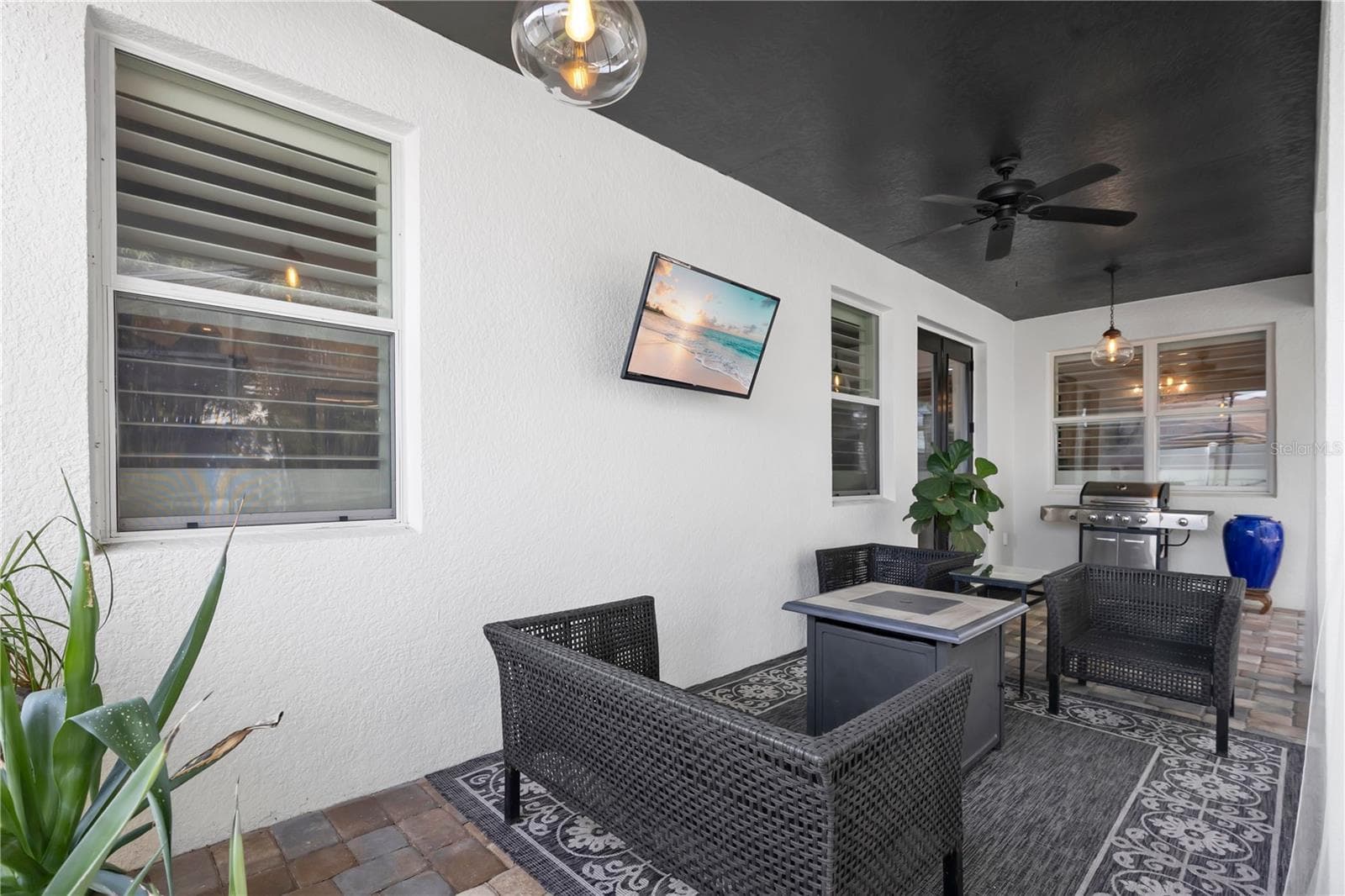 Covered patio with pool view - 13547 PITANGA ST, CLERMONT