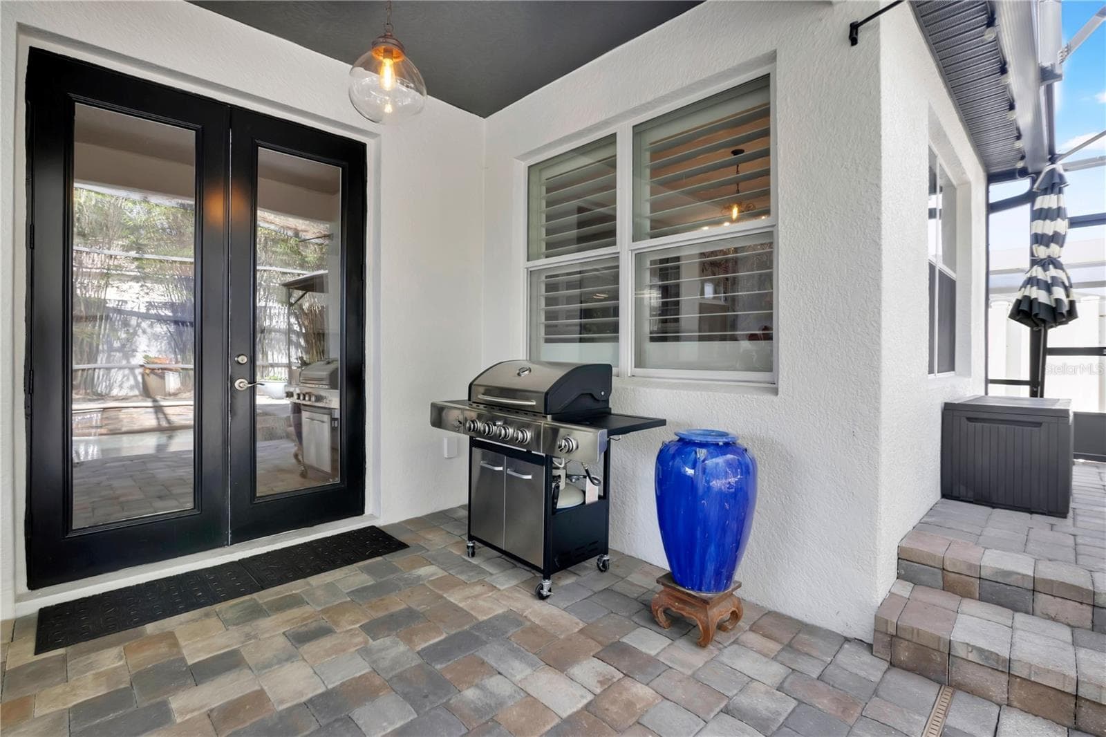 Entry into home from Screen-enclosed Pool Area - 13547 PITANGA ST, CLERMONT