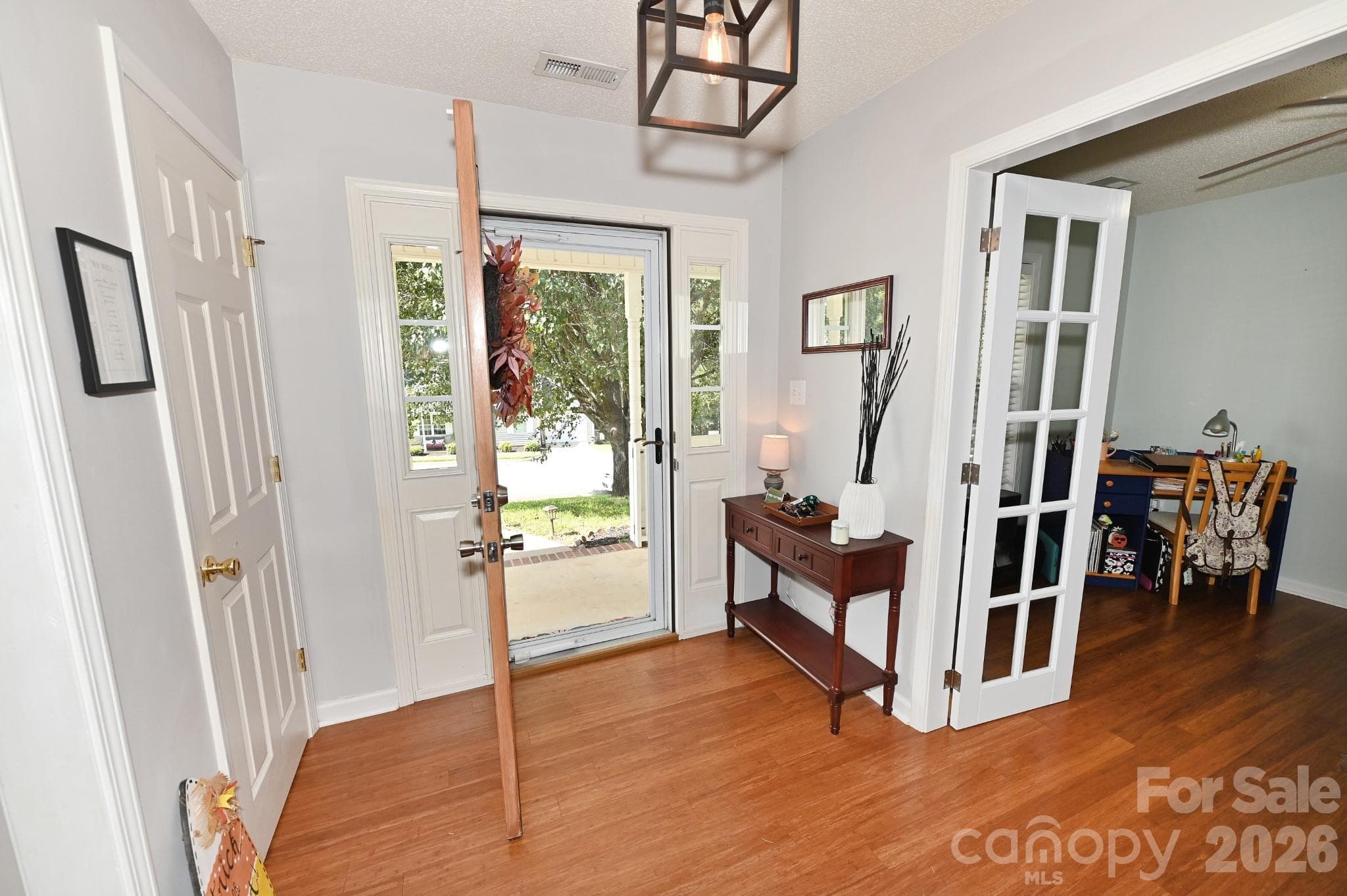 Inviting foyer with coat closet to the left and office to the right - 236 17th Avenue SE, Hickory