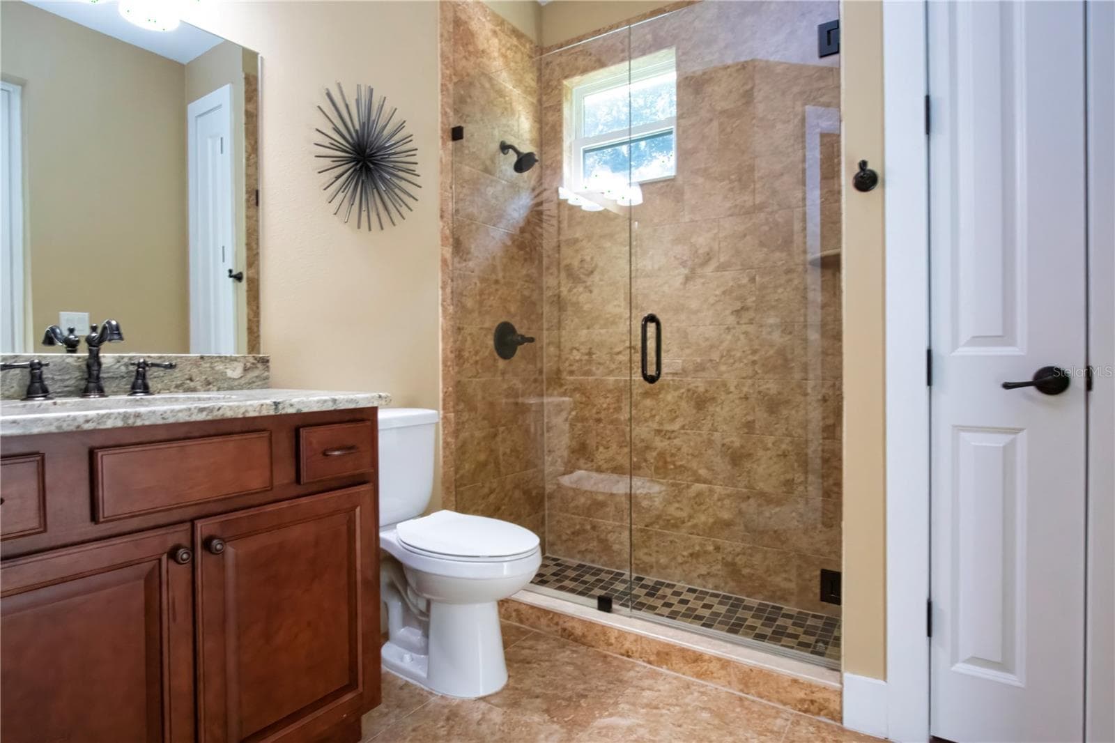 3rd full bathroom next to 4th bedroom - 1605 BUTCH CASSIDY TRL, WIMAUMA
