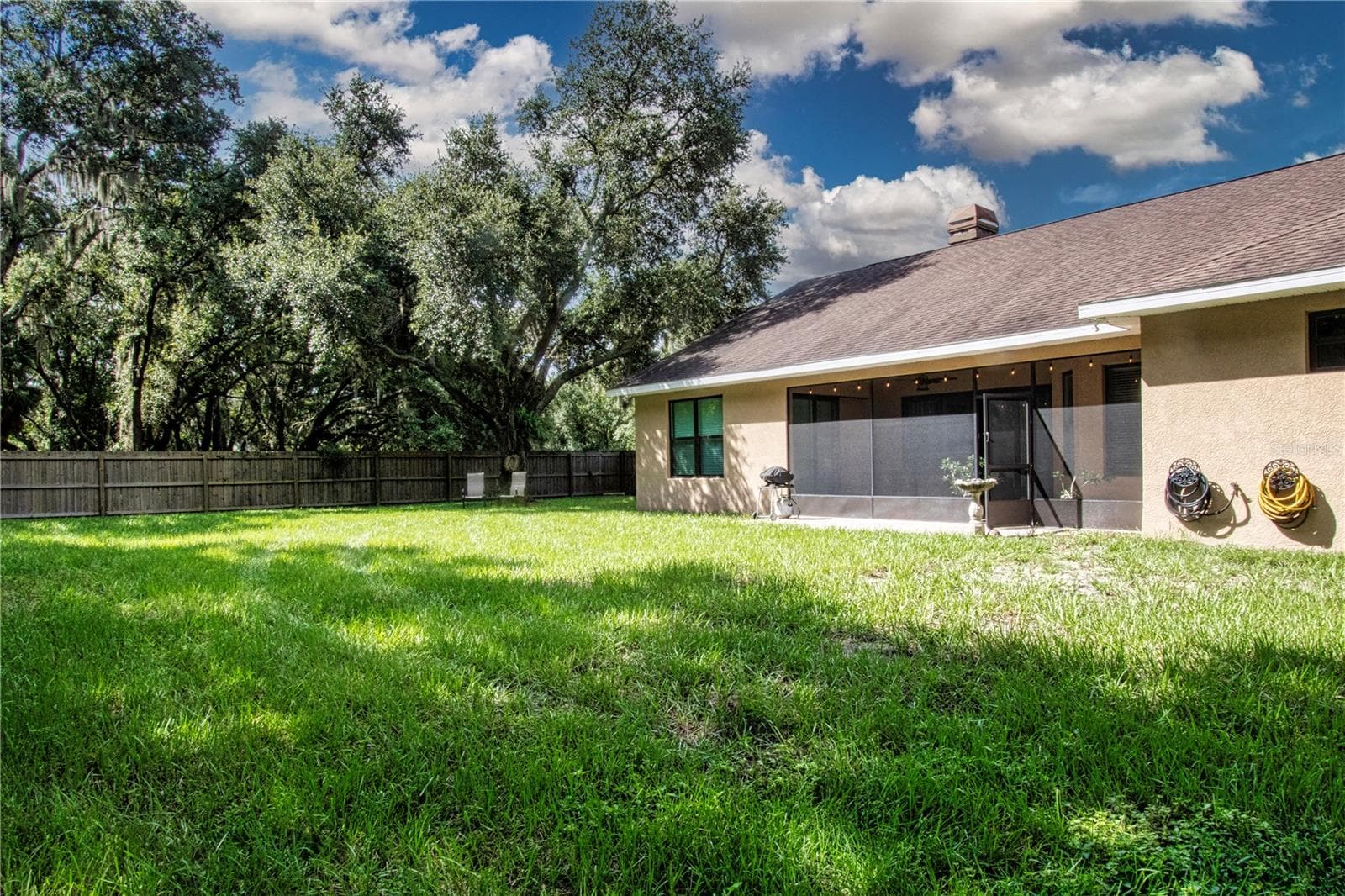 Back view of home - 1605 BUTCH CASSIDY TRL, WIMAUMA