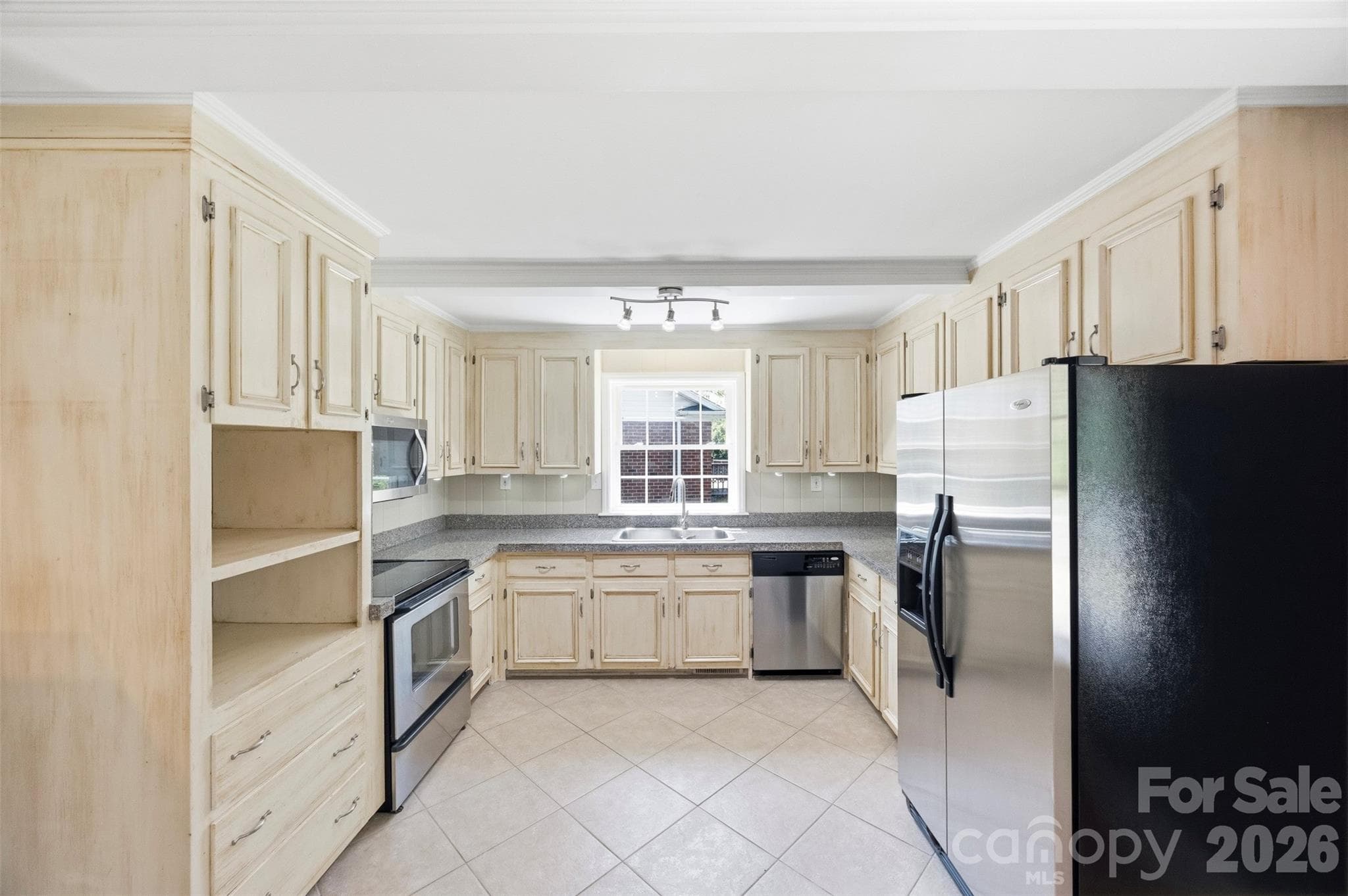This is a highly functional kitchen that celebrates the simplicity, proportion and practical characteristic of it's era. - 6506 Candlewood Drive, Charlotte