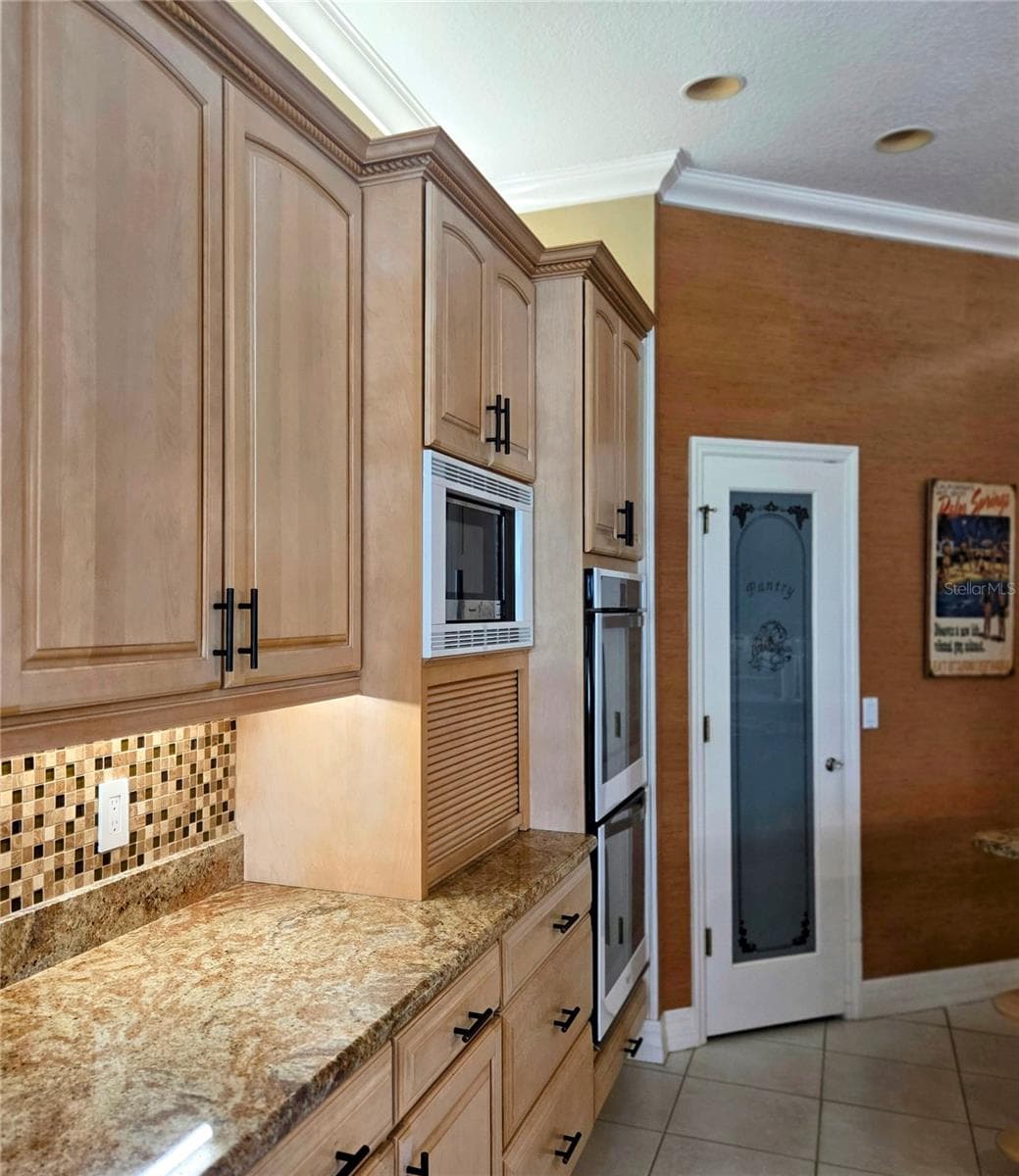 Pull down door to hide some appliance and large walk in pantry - 82 LAGARE ST, PALM COAST