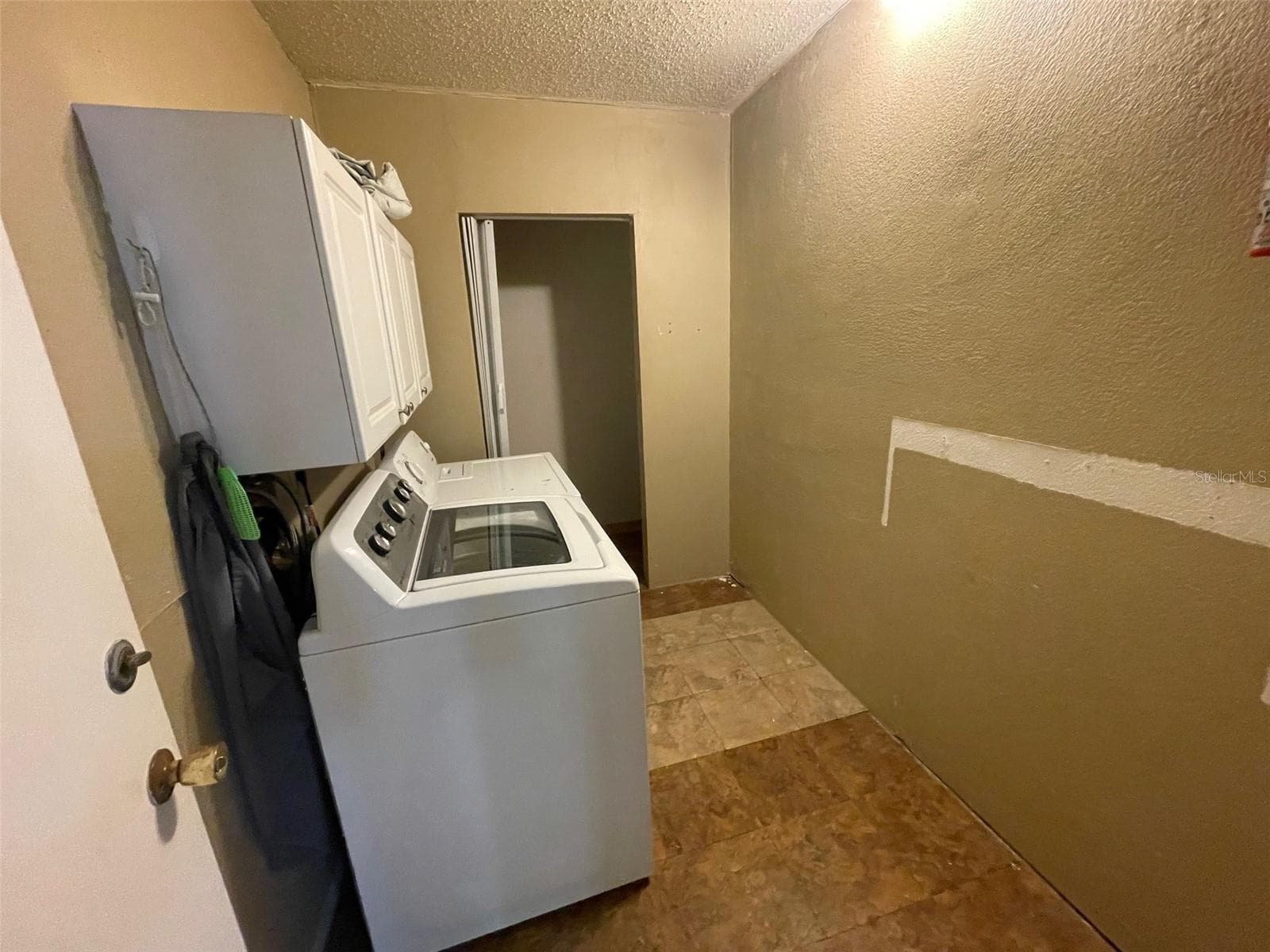 Inside laundry room with storage closet - 23320 VAN BUREN AVE, PORT CHARLOTTE