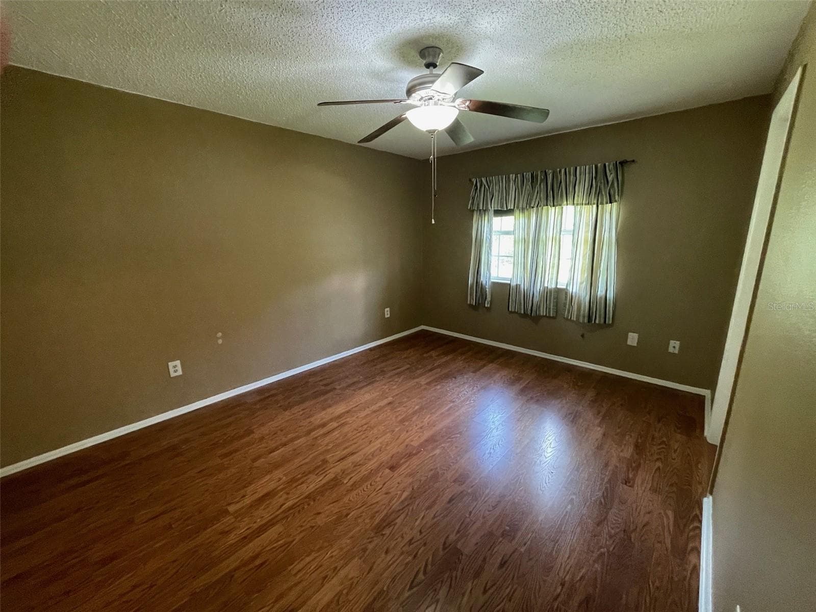 Primary bedroom with walk in closet and private door to bathroom - 23320 VAN BUREN AVE, PORT CHARLOTTE