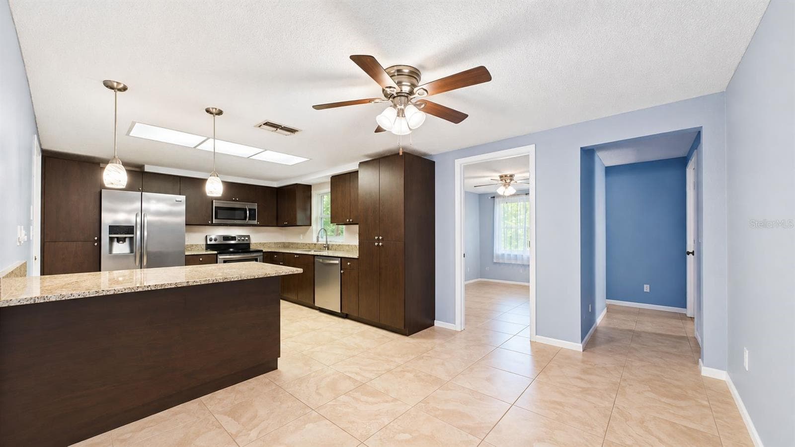 Dining room right off the kitchen - 8840 CARMEN LN, PORT RICHEY