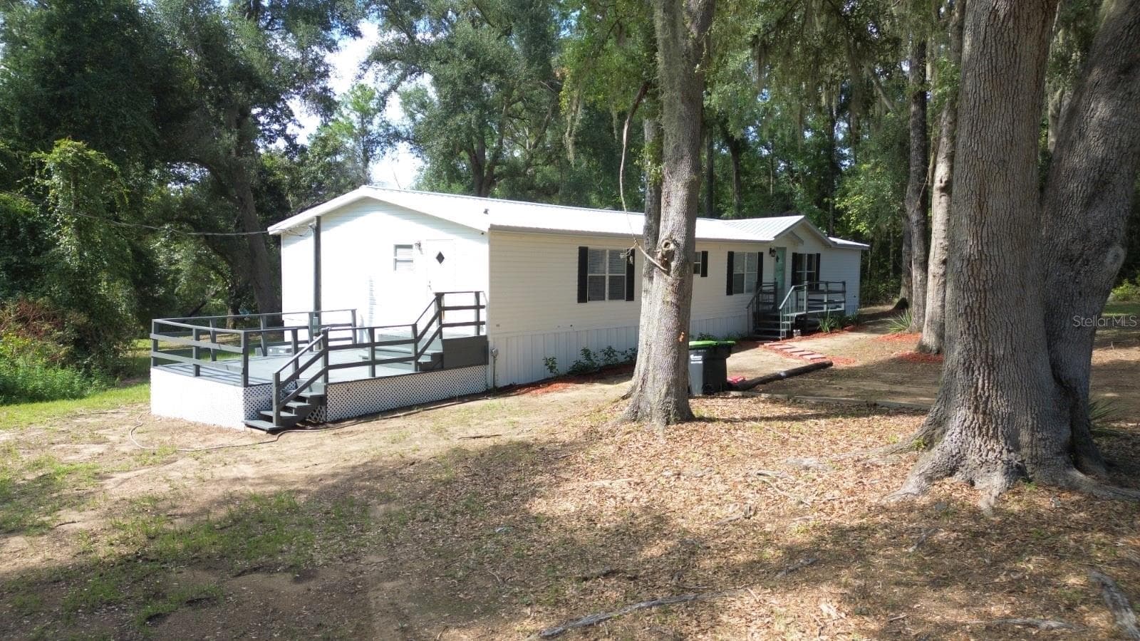 Manufactured Home at 3391 NW BUR OAK PL, JENNINGS, photo 2 of 34