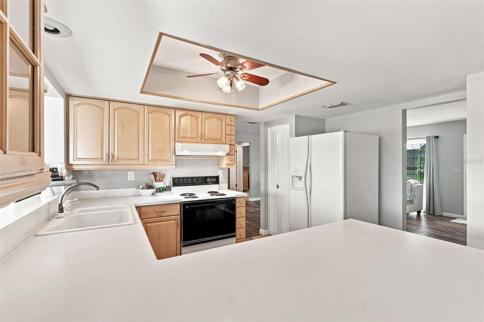 Ample Cabinetry, Tray Ceiling & Natural Light - 155 MORGAN LN SE, PORT CHARLOTTE