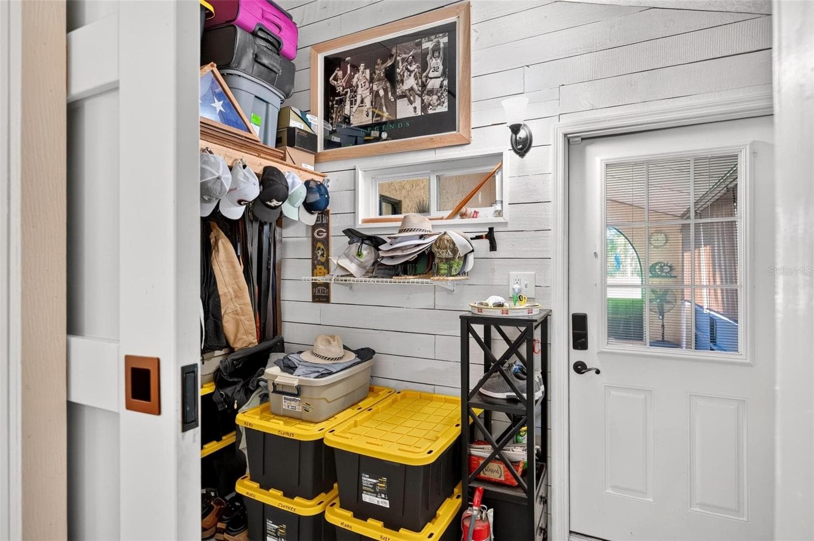 Additional walk-in/storage closet with front lanai & garage access - 8106 SPRING DR, YALAHA
