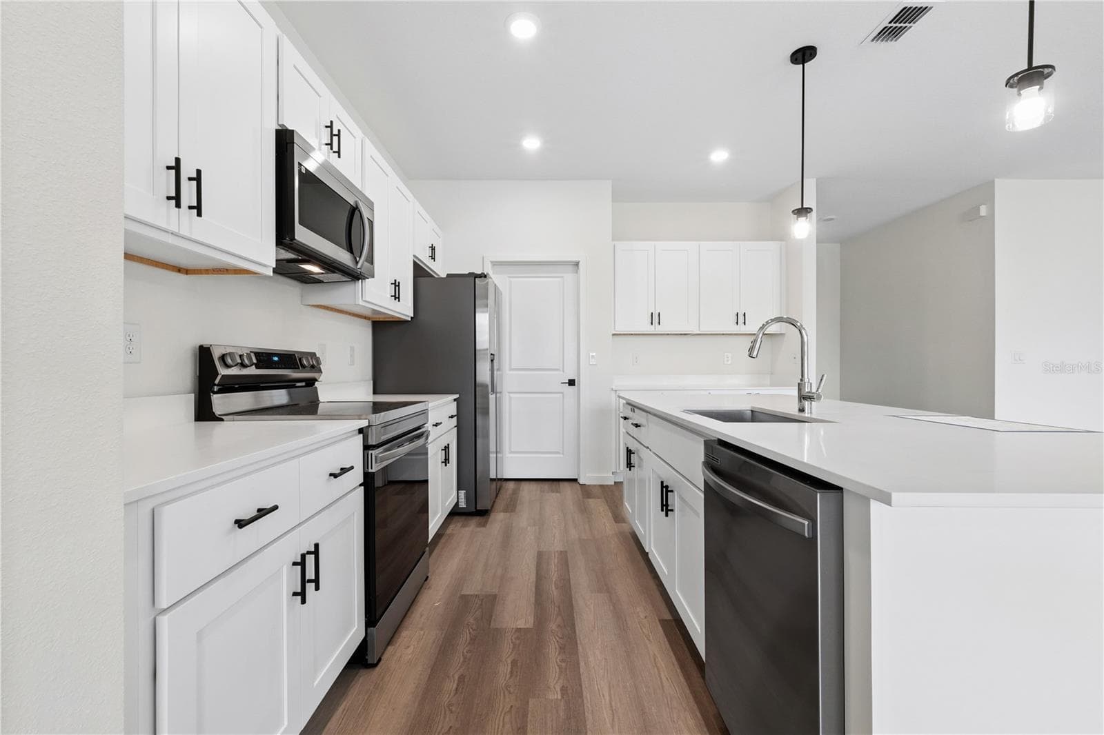 Photos are of same model. Finishes and colors may vary. - 21 BONNIE LN, PALM COAST