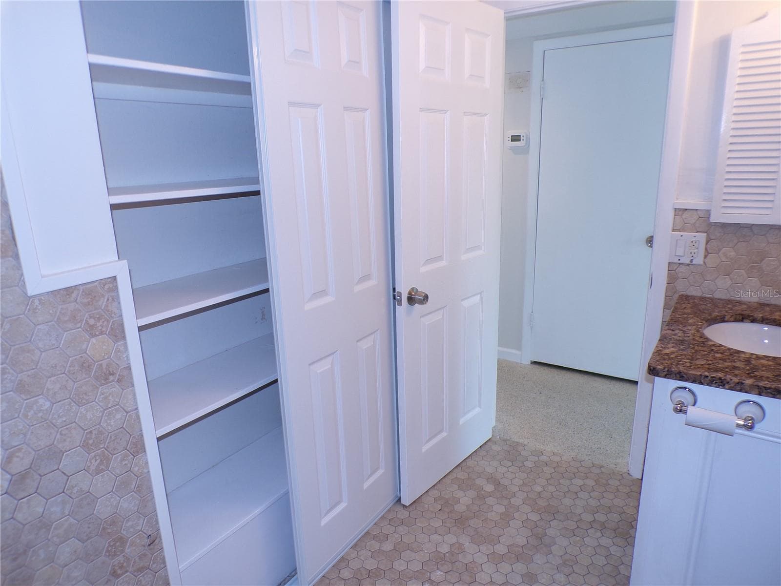 Built in linen closet in bathroom - 2185 EASY ST, PORT CHARLOTTE