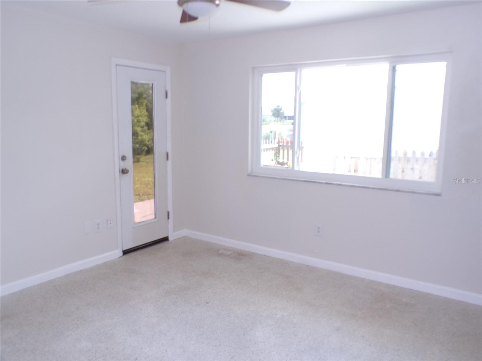 Primary bedroom has egress to patio and back yard - 2185 EASY ST, PORT CHARLOTTE