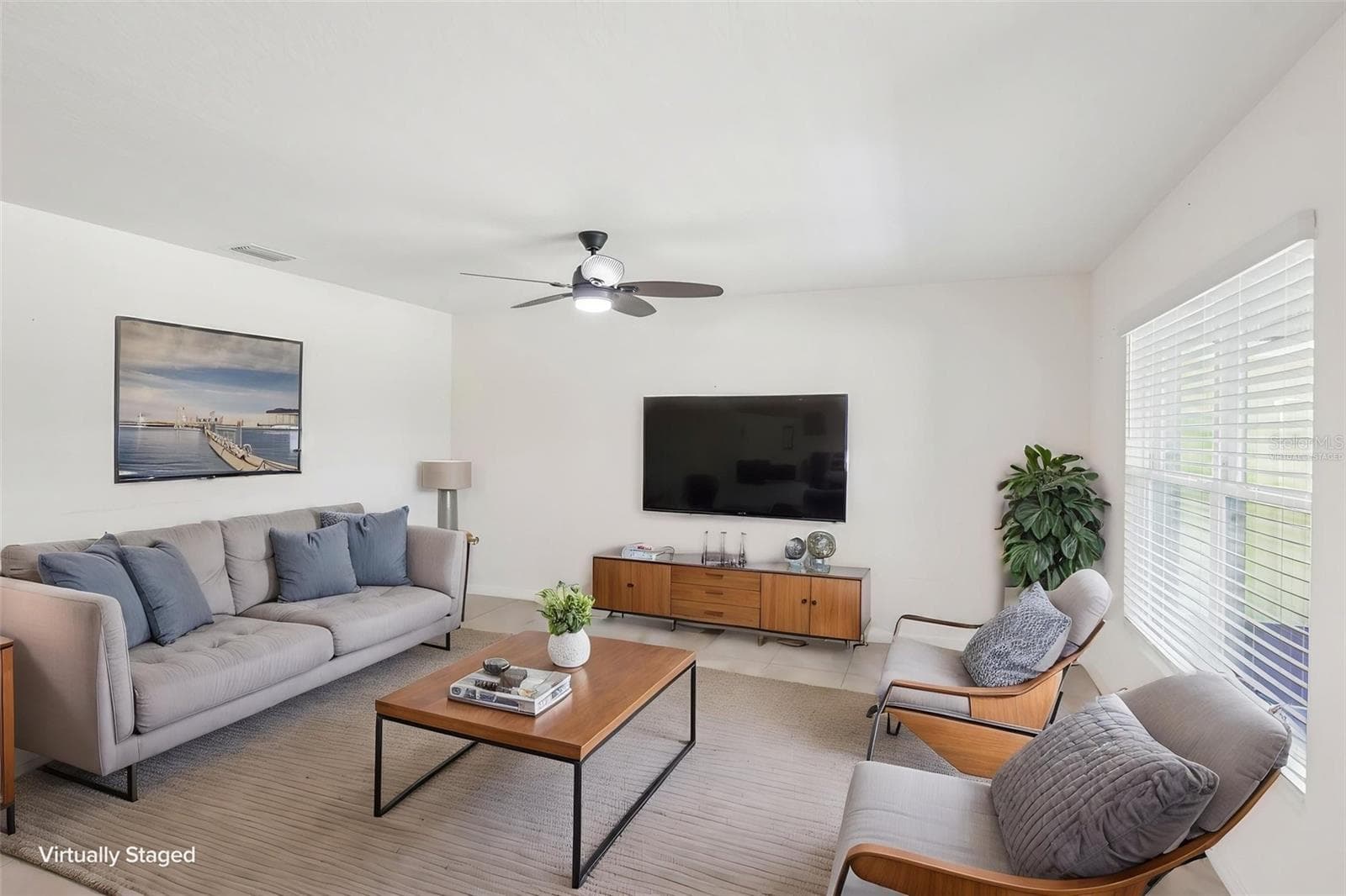 Virtually staged living room - 36945 GOFFAUX LOOP, ZEPHYRHILLS