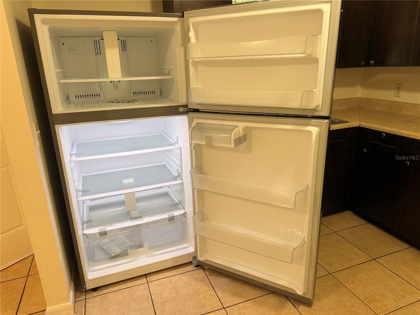 New Stainless Steel Fridge - 9406 N HARTTS DR #A, TAMPA