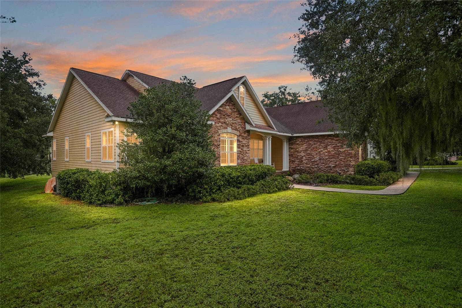 Twilight Image: Front of House - 18350 HANCOCK BLUFF RD, DADE CITY