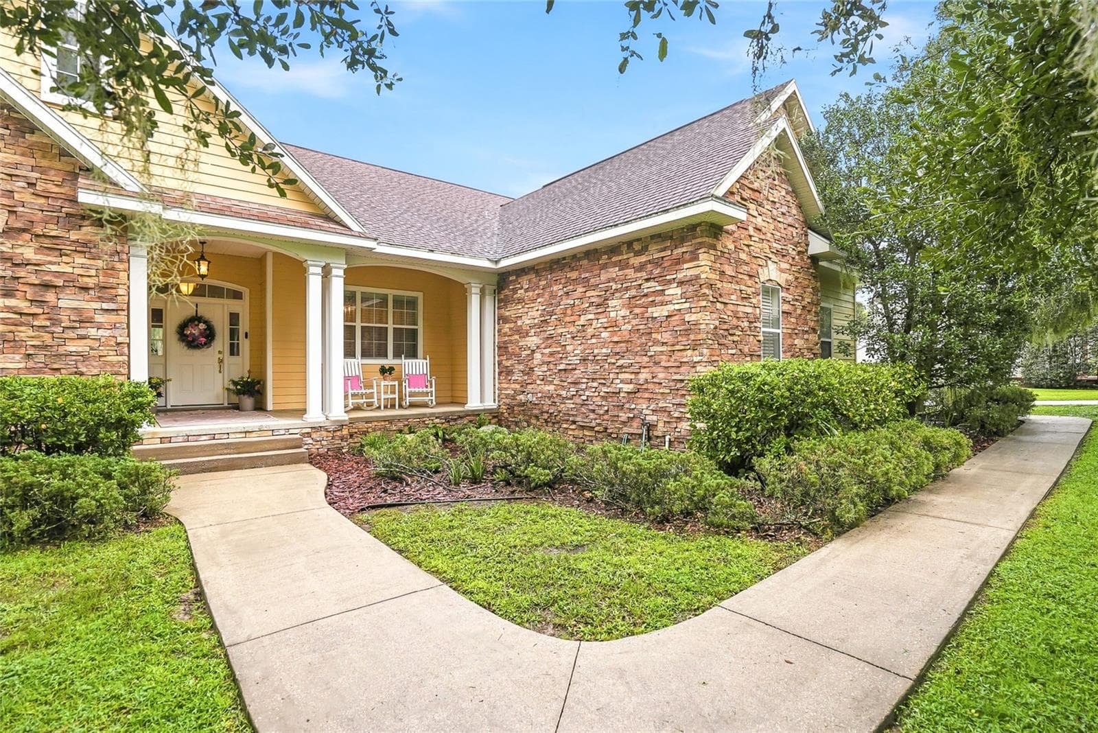 Sidewalk from driveway to front door - 18350 HANCOCK BLUFF RD, DADE CITY