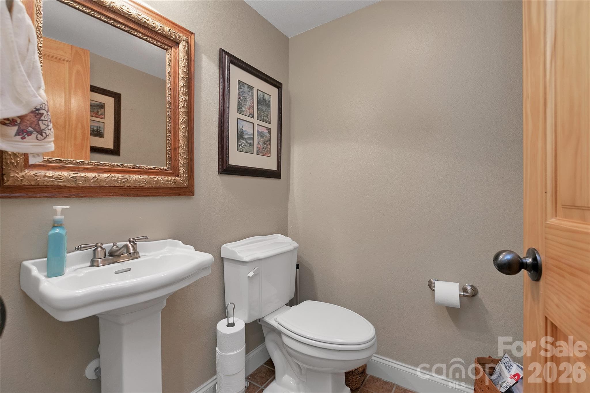 Half bath between Entryway and Great Room - 111 Kanunu Court, Brevard