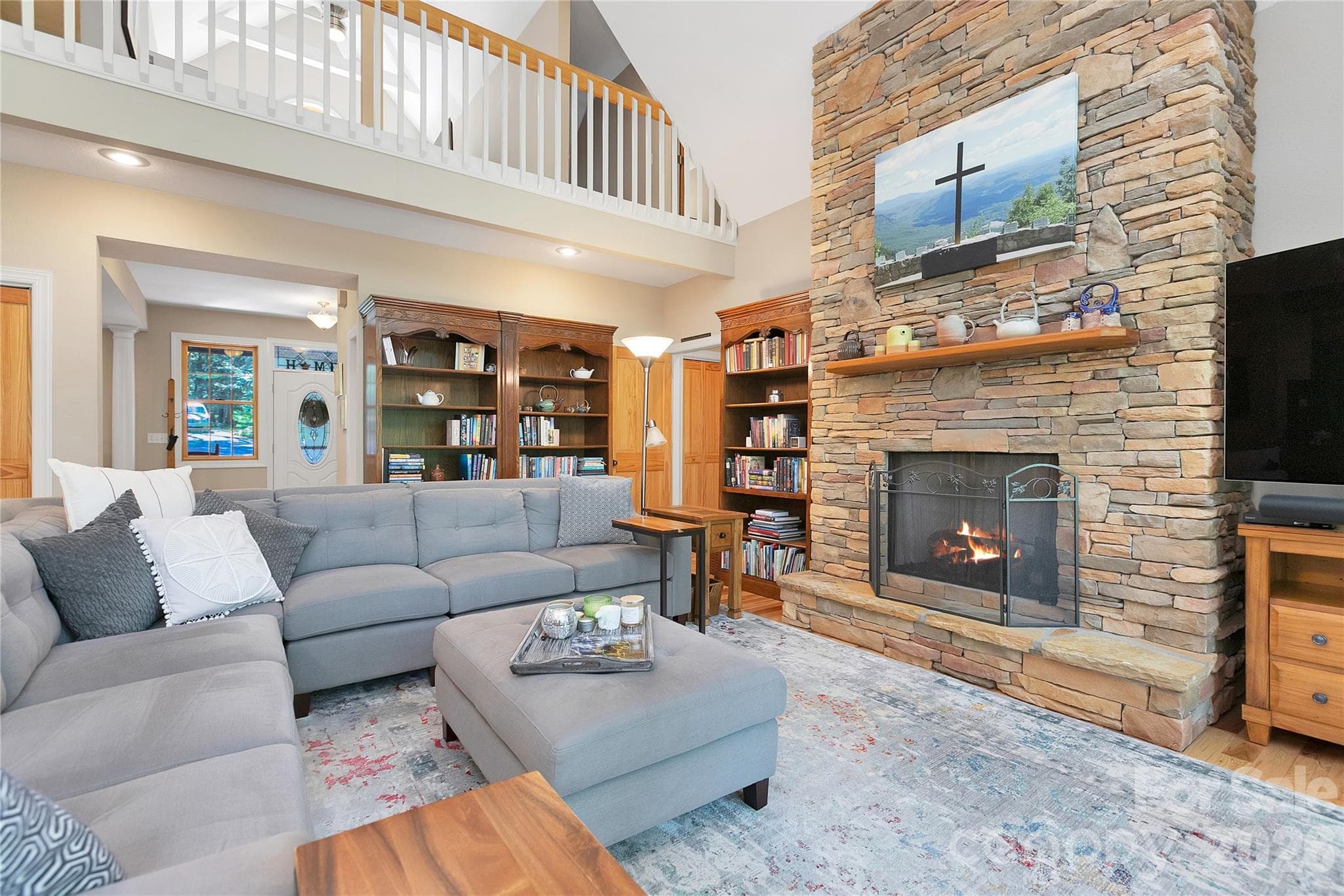 Loft upstairs overlooks the fireplace - 111 Kanunu Court, Brevard