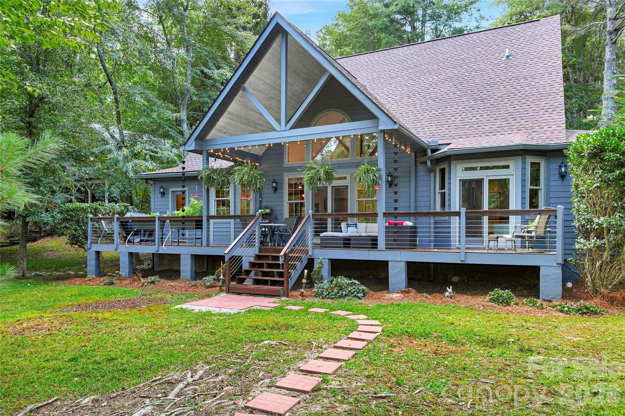 View from the Dock to the house. - 111 Kanunu Court, Brevard