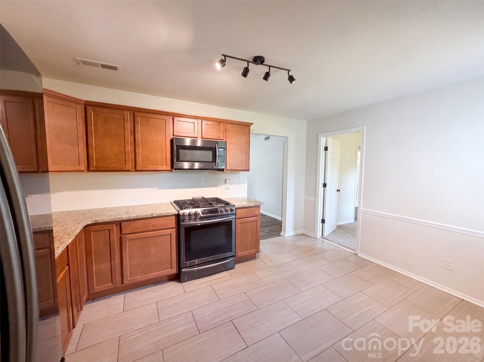 Single Family Residence at 728 Milan Road E, Charlotte, photo 2 of 20