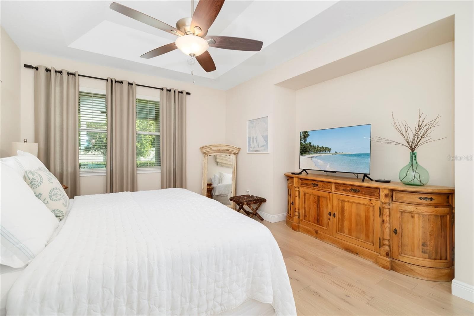 Primary Bedroom on the first level with Hardwood Flooring - 3616 PITCH LN, SARASOTA