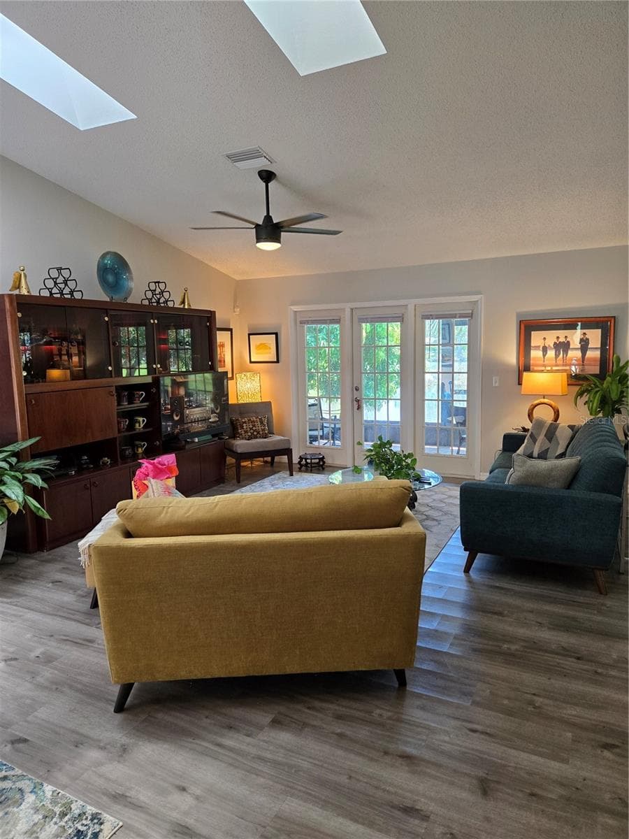 living room with skylights - 5627 29TH STREET CIR E, BRADENTON