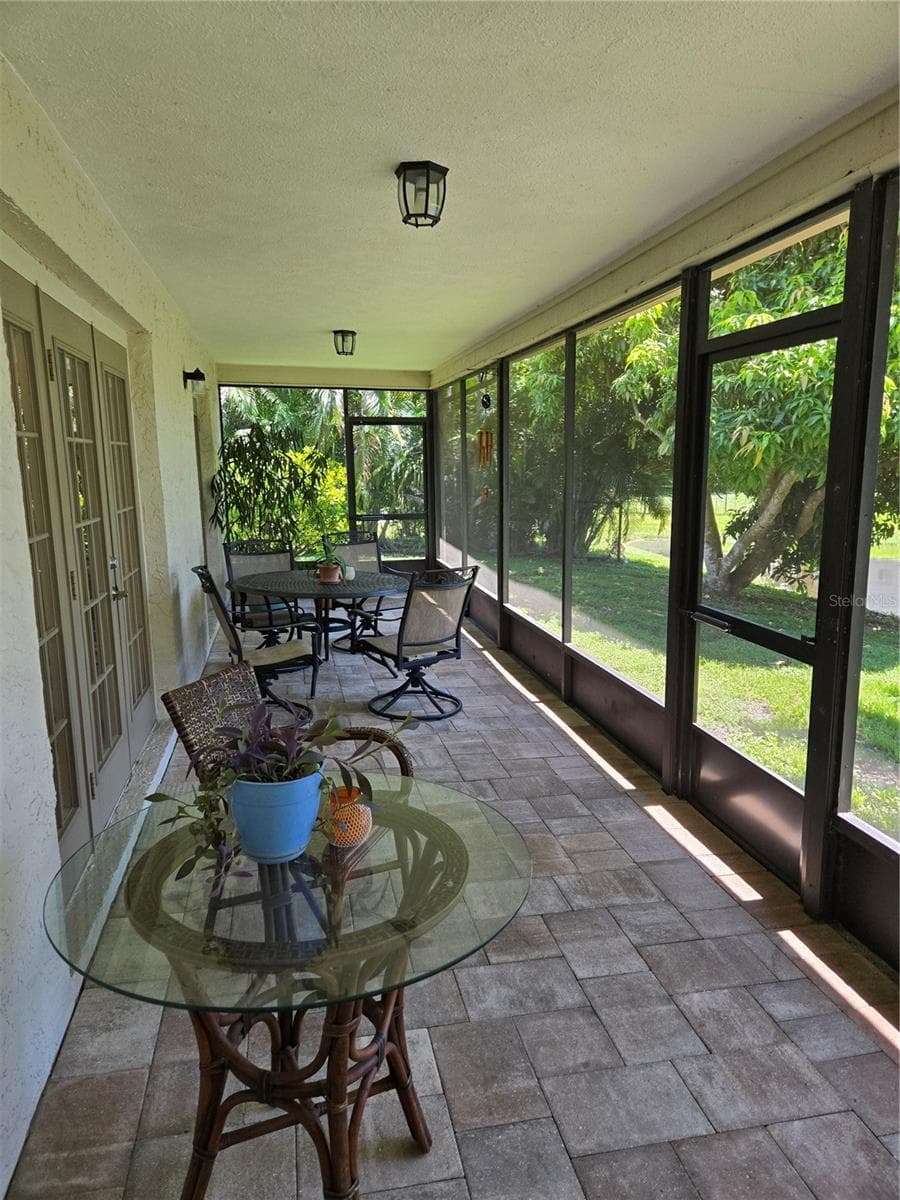 screen porch on the pood - 5627 29TH STREET CIR E, BRADENTON